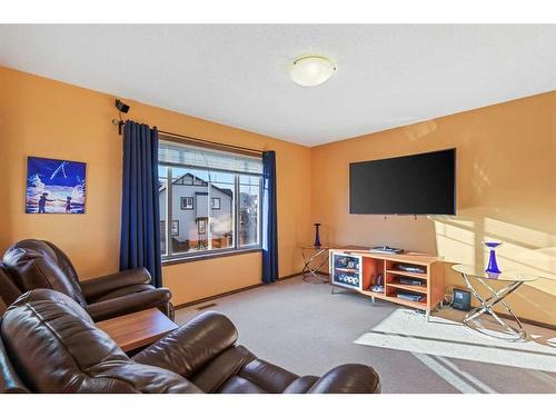 304 New Brighton Place Se, Calgary, AB - Indoor Photo Showing Living Room