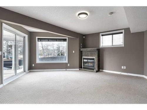 174 Cranfield Green Se, Calgary, AB - Indoor With Fireplace