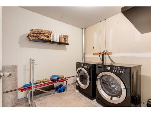 302 Elgin View Se, Calgary, AB - Indoor Photo Showing Laundry Room