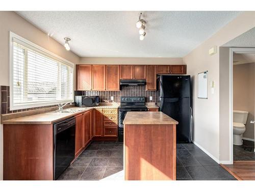 302 Elgin View Se, Calgary, AB - Indoor Photo Showing Kitchen