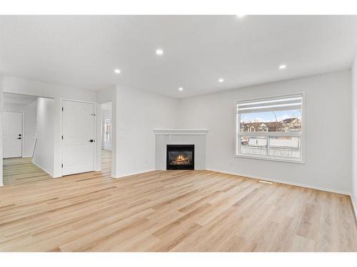 9 Saddlemead Road Ne, Calgary, AB - Indoor Photo Showing Living Room With Fireplace