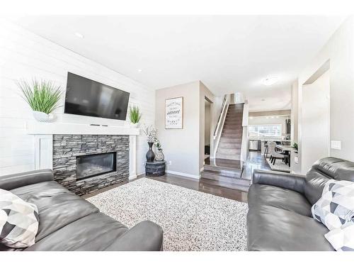 163 Mahogany Grove Se, Calgary, AB - Indoor Photo Showing Living Room With Fireplace