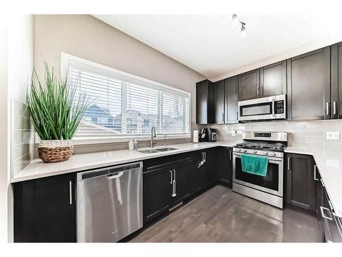 163 Mahogany Grove Se, Calgary, AB - Indoor Photo Showing Kitchen With Double Sink