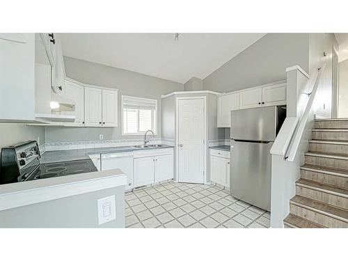 112 Covewood Close Ne, Calgary, AB - Indoor Photo Showing Kitchen With Double Sink