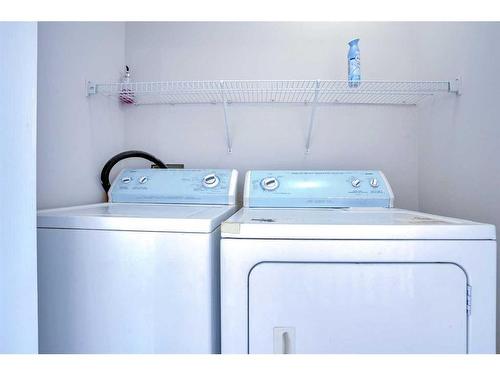 21 Panorama Hills Way Nw, Calgary, AB - Indoor Photo Showing Laundry Room