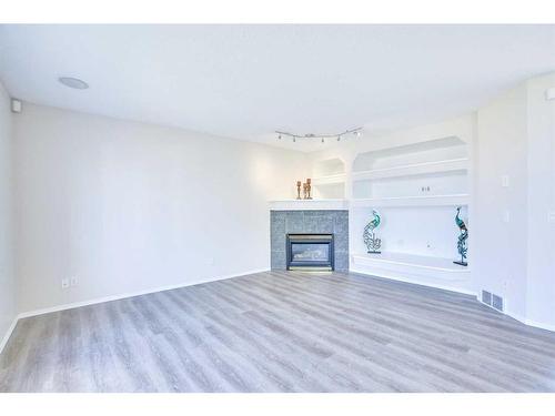 21 Panorama Hills Way Nw, Calgary, AB - Indoor Photo Showing Living Room With Fireplace