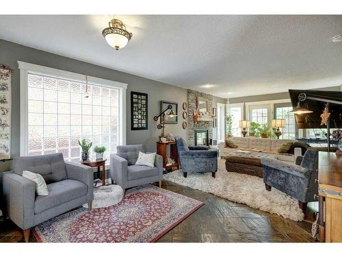 5003 Norris Road Nw, Calgary, AB - Indoor Photo Showing Living Room With Fireplace