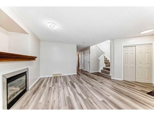 330 Everglen Rise Sw, Calgary, AB - Indoor With Fireplace