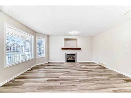 330 Everglen Rise Sw, Calgary, AB - Indoor With Fireplace