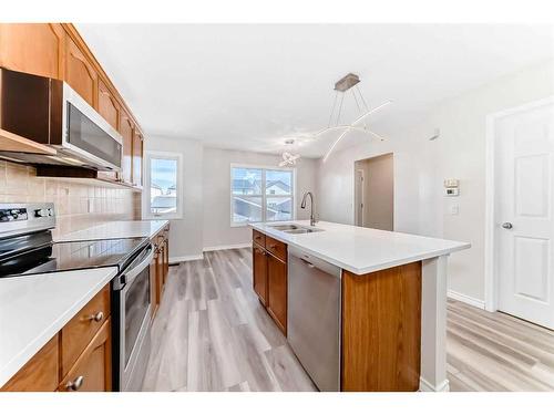 330 Everglen Rise Sw, Calgary, AB - Indoor Photo Showing Kitchen With Double Sink