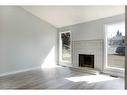 343 Ranchview Mews Nw, Calgary, AB  - Indoor Photo Showing Living Room With Fireplace 