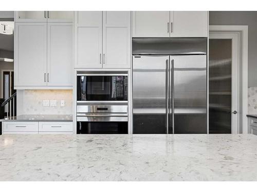 75 Aspen Summit Court Sw, Calgary, AB - Indoor Photo Showing Kitchen With Stainless Steel Kitchen