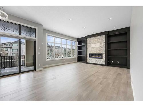 75 Aspen Summit Court Sw, Calgary, AB - Indoor With Fireplace