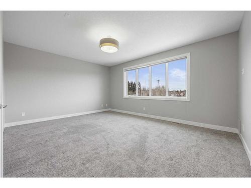 75 Aspen Summit Court Sw, Calgary, AB - Indoor Photo Showing Other Room