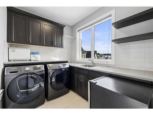 75 Aspen Summit Court Sw, Calgary, AB - Indoor Photo Showing Laundry Room