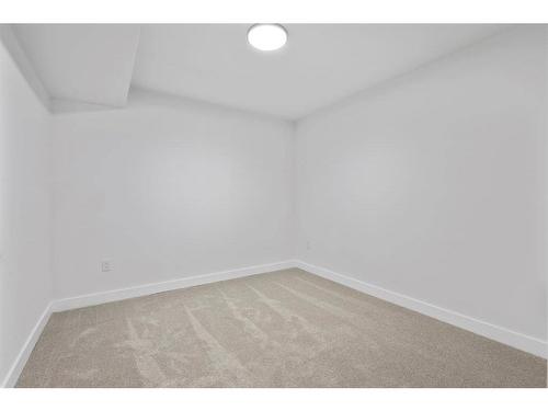 11120 Braeside Drive Sw, Calgary, AB - Indoor Photo Showing Other Room