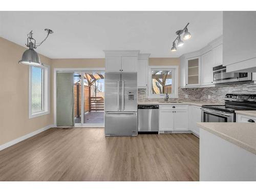 64 Hidden Way Nw, Calgary, AB - Indoor Photo Showing Kitchen With Stainless Steel Kitchen With Upgraded Kitchen