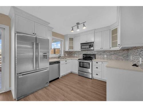 64 Hidden Way Nw, Calgary, AB - Indoor Photo Showing Kitchen With Stainless Steel Kitchen With Upgraded Kitchen