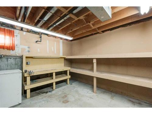 7 Lake Sundance Place Se, Calgary, AB - Indoor Photo Showing Basement