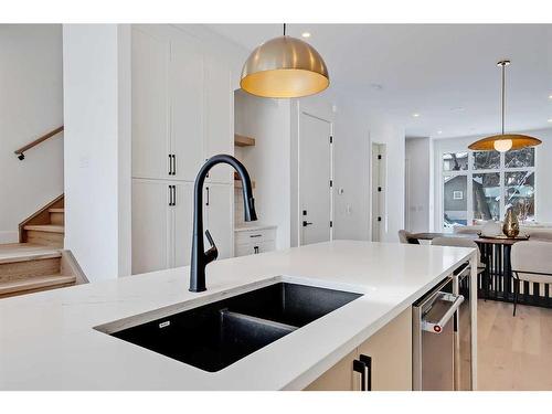 215 25 Avenue Nw, Calgary, AB - Indoor Photo Showing Kitchen With Double Sink