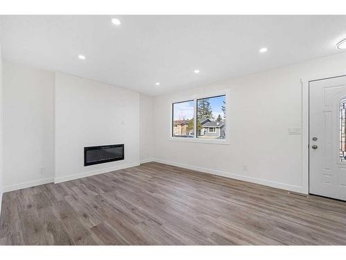 6701 29 Avenue Ne, Calgary, AB - Indoor With Fireplace