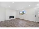 6701 29 Avenue Ne, Calgary, AB  - Indoor With Fireplace 