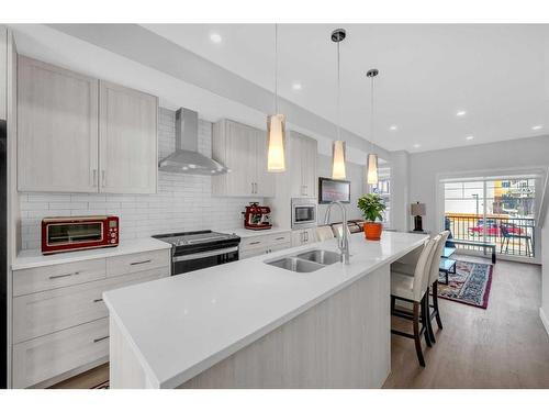 615 Sage Hill Grove Nw, Calgary, AB - Indoor Photo Showing Kitchen With Double Sink With Upgraded Kitchen