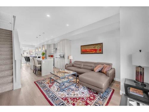 615 Sage Hill Grove Nw, Calgary, AB - Indoor Photo Showing Living Room With Fireplace