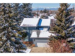 15 Woodmont Crescent SW Calgary, AB T2W 4N2