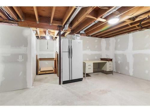 33 Shawnee View Sw, Calgary, AB - Indoor Photo Showing Basement