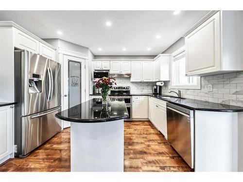 231 Rocky Ridge Close Nw, Calgary, AB - Indoor Photo Showing Kitchen With Stainless Steel Kitchen With Upgraded Kitchen