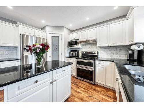 231 Rocky Ridge Close Nw, Calgary, AB - Indoor Photo Showing Kitchen With Stainless Steel Kitchen With Upgraded Kitchen