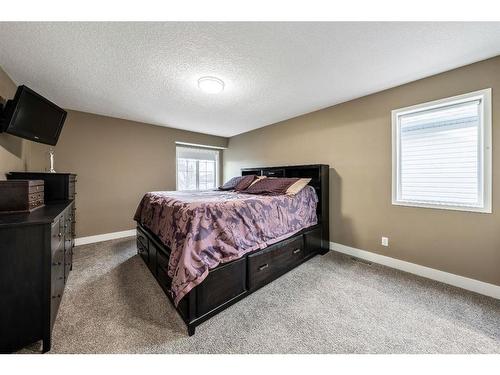 231 Rocky Ridge Close Nw, Calgary, AB - Indoor Photo Showing Bedroom