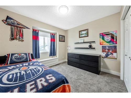 231 Rocky Ridge Close Nw, Calgary, AB - Indoor Photo Showing Bedroom