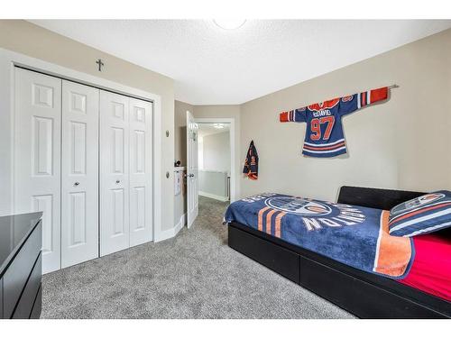 231 Rocky Ridge Close Nw, Calgary, AB - Indoor Photo Showing Bedroom