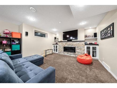 231 Rocky Ridge Close Nw, Calgary, AB - Indoor With Fireplace