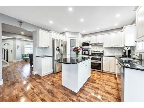 231 Rocky Ridge Close Nw, Calgary, AB - Indoor Photo Showing Kitchen With Stainless Steel Kitchen With Upgraded Kitchen