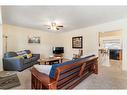 2822 40 Street Sw, Calgary, AB  - Indoor Photo Showing Living Room 