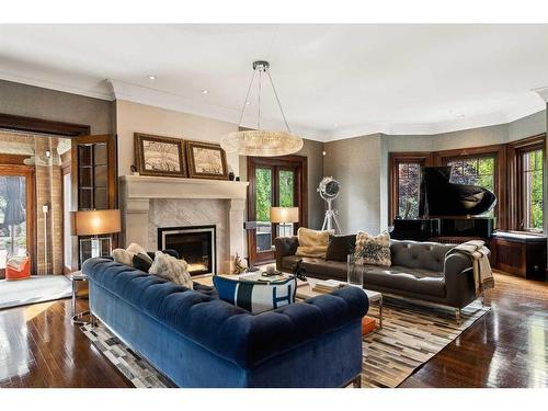 930 Prospect Avenue Sw, Calgary, AB - Indoor Photo Showing Living Room With Fireplace