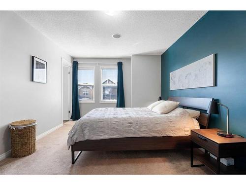 149 New Brighton Green Se, Calgary, AB - Indoor Photo Showing Bedroom