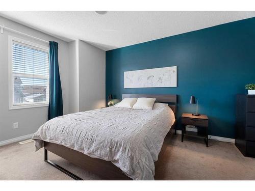 149 New Brighton Green Se, Calgary, AB - Indoor Photo Showing Bedroom