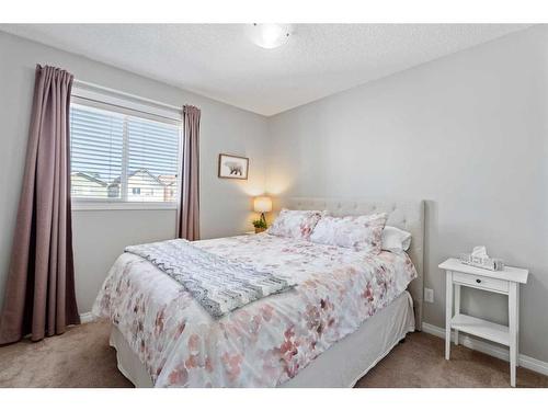 149 New Brighton Green Se, Calgary, AB - Indoor Photo Showing Bedroom