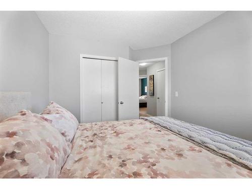 149 New Brighton Green Se, Calgary, AB - Indoor Photo Showing Bedroom