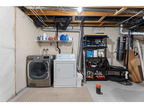 149 New Brighton Green Se, Calgary, AB - Indoor Photo Showing Laundry Room