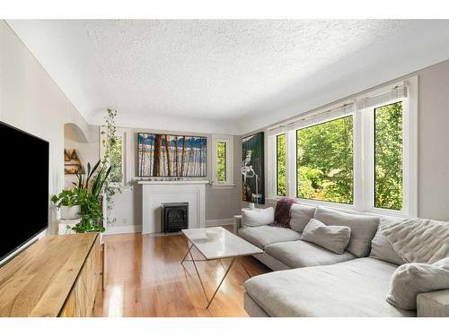 1925 12 Avenue Sw, Calgary, AB - Indoor Photo Showing Living Room With Fireplace