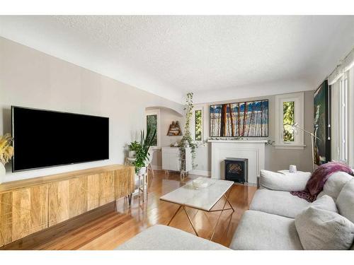 1925 12 Avenue Sw, Calgary, AB - Indoor Photo Showing Living Room With Fireplace