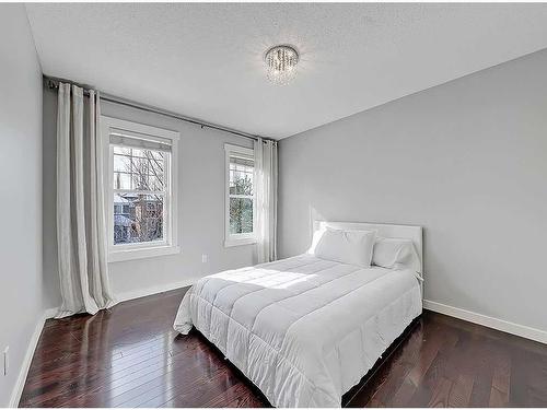 18 Evergreen Avenue Sw, Calgary, AB - Indoor Photo Showing Bedroom