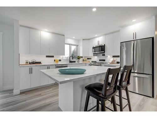 435 Queensland Road Se, Calgary, AB - Indoor Photo Showing Kitchen With Upgraded Kitchen