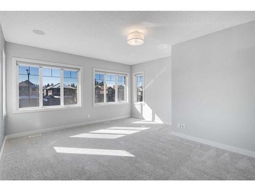 338 Shawnee Boulevard Sw, Calgary, AB - Indoor Photo Showing Other Room