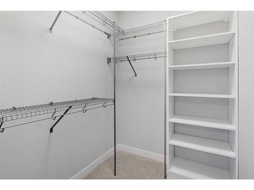 338 Shawnee Boulevard Sw, Calgary, AB - Indoor With Storage